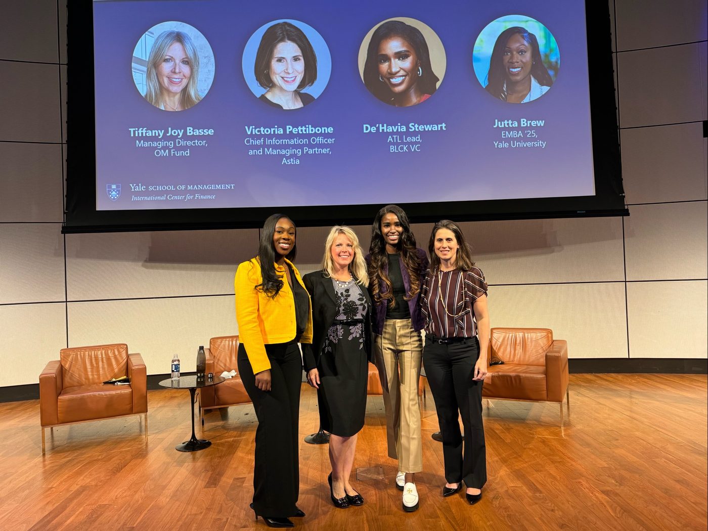 Tiffany Joy Basse with fellow panelists on the Yale School of Management stage
